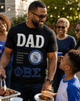 African American father wearing Phi Beta Sigma Dad shirt at a family cookout gathering