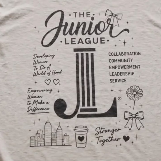 Editorial-style Instagram reel featuring the Junior League ‘Women Who Build’ boutique t-shirt collection on Comfort Colors garment-dyed tees. The video highlights soft premium textures, elevated feminine styling, and empowering messaging focused on collaboration, leadership, community impact, and women building a better world.