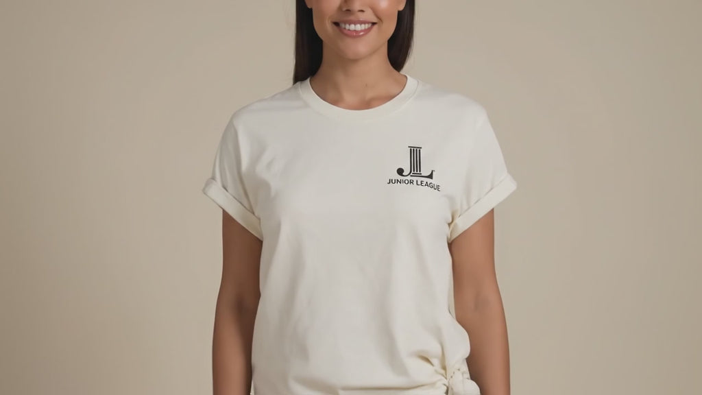 Lifestyle promotional video showcasing the Junior League ‘Women Who Build’ Comfort Colors garment-dyed t-shirt collection in multiple colorways including Berry, Blue Jean, Sage, Blossom, Graphite, Ivory, Terracotta, and Espresso. Video features elevated boutique styling, leadership-inspired messaging, and lifestyle scenes centered around community, empowerment, and service.