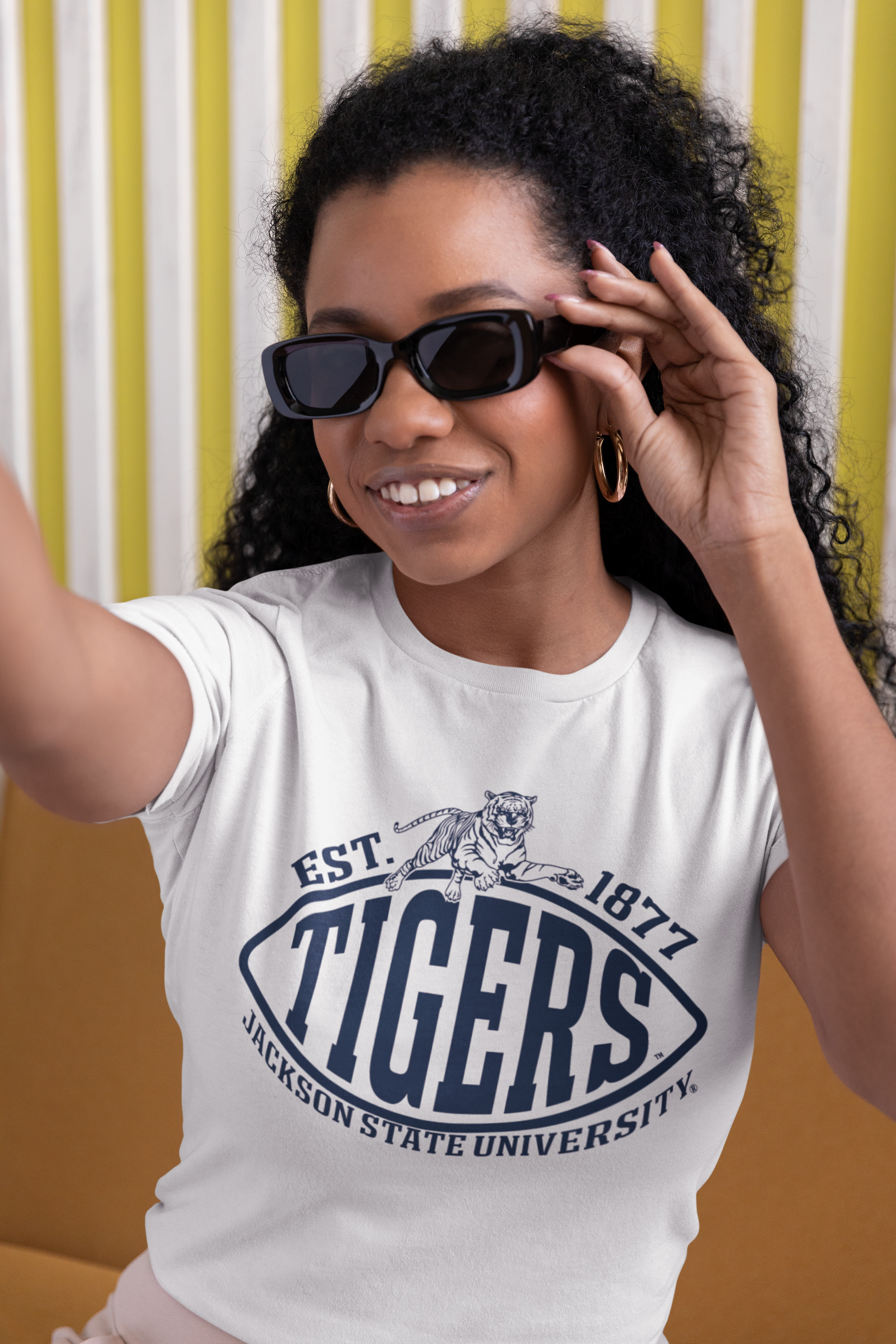 White crew neck short-sleeve T-shirt with TIGERS and EST. 1877 graphic.