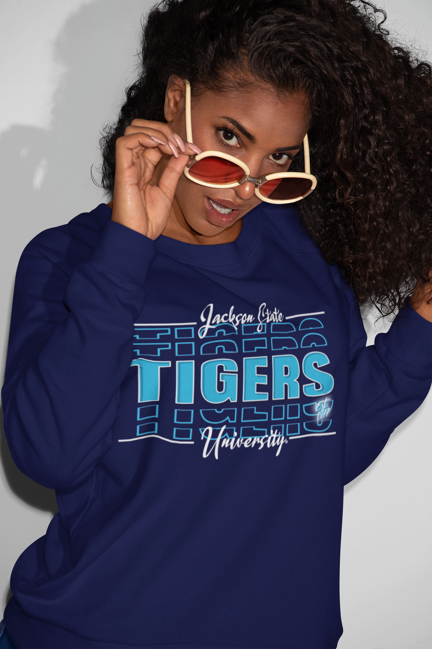 Navy sweatshirt with “Tigers” logo and varsity text graphic on the front