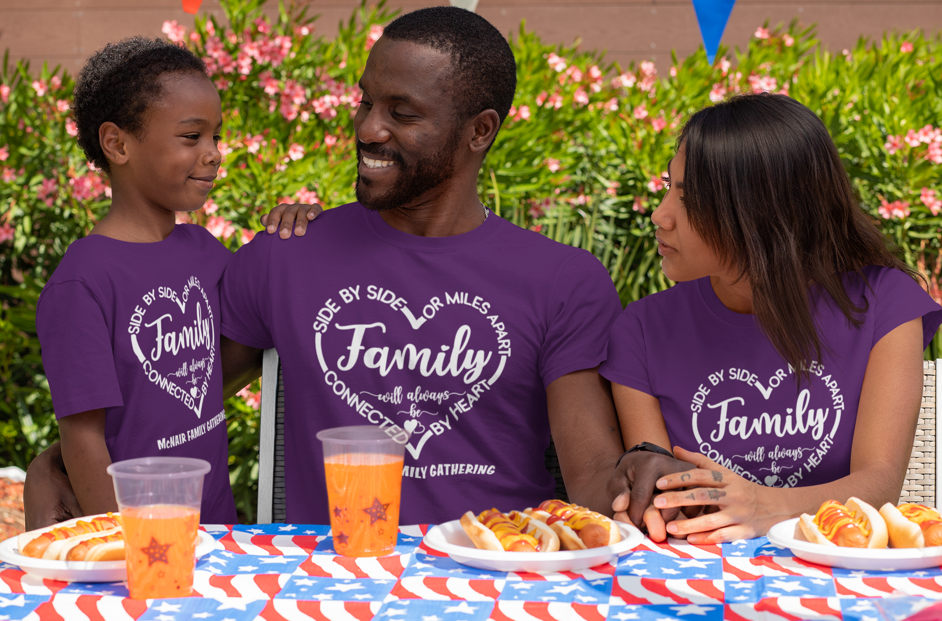 Purple short-sleeve T-shirt with Family heart graphic, worn by family members