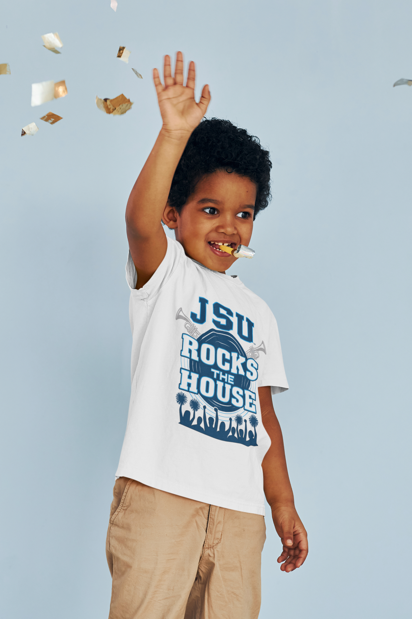 Toddler white T-shirt worn by a child, with JSU Rocks the House front graphic