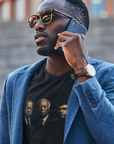 Black short-sleeve graphic T-shirt with three men portrait print on the chest