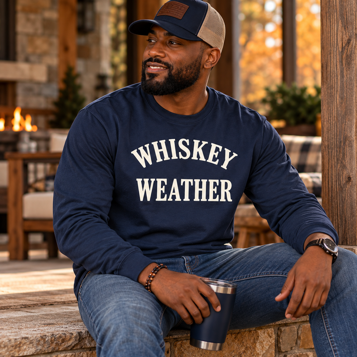 Black man wearing Navy Whiskey Weather long sleeve T-shirt in an autumn lifestyle setting