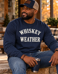 Black man wearing Navy Whiskey Weather long sleeve T-shirt in an autumn lifestyle setting