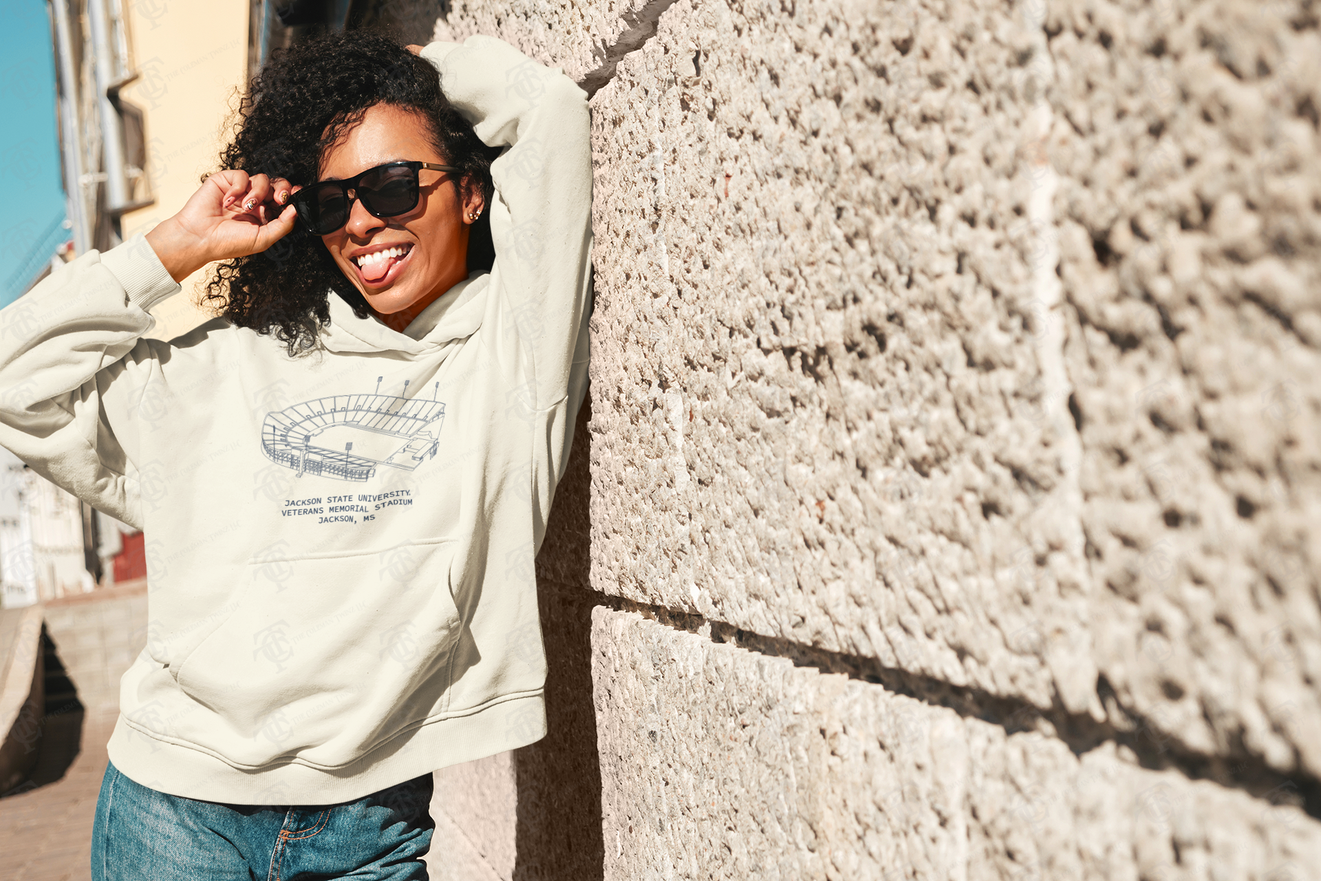 Unisex pullover hoodie in sweet cream heather with stadium graphic, hood, kangaroo pocket