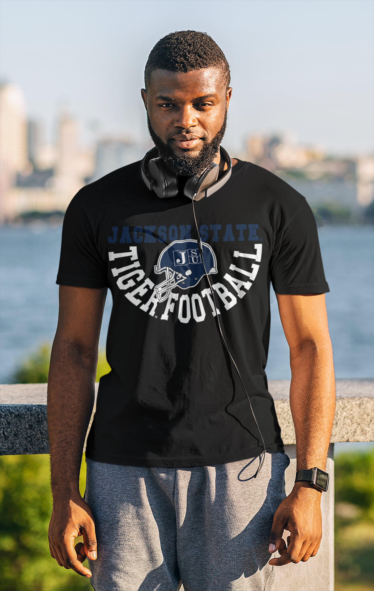 Unisex crew-neck short-sleeve T-shirt with front football logo graphic, black