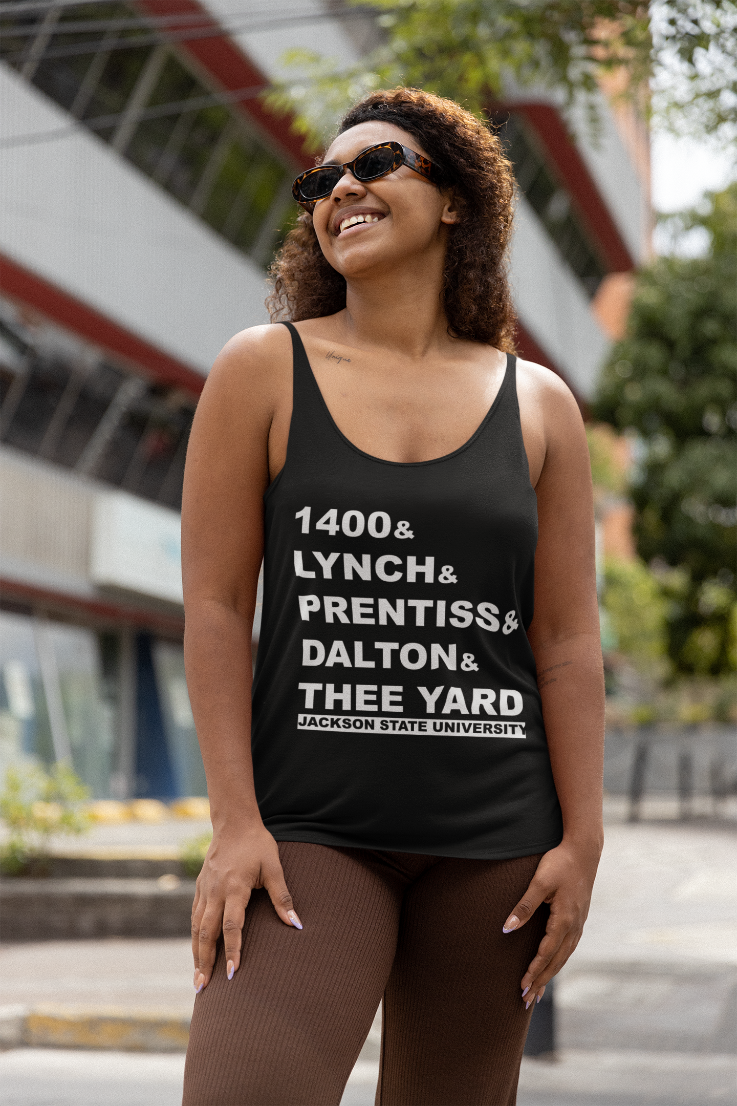 Black unisex tank top with large front lettering and Jackson State University logo.