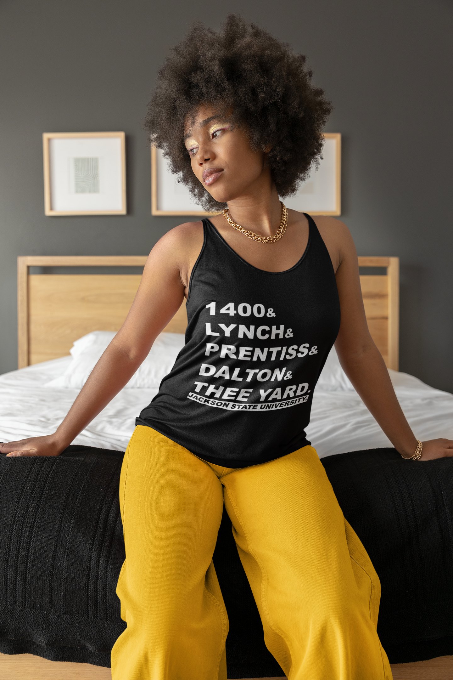 Black unisex tank top with front graphic lettering and Jackson State University logo.
