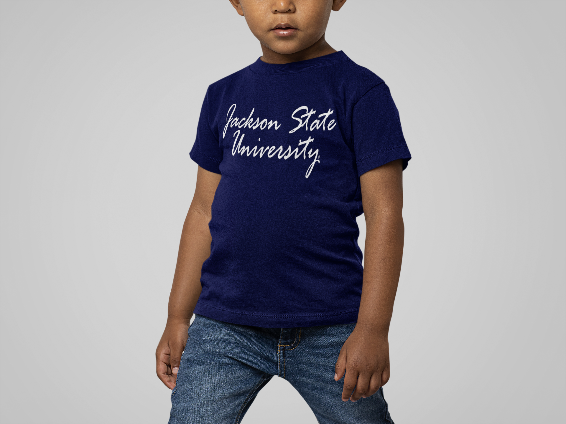 Navy youth short-sleeve T-shirt with white script university logo, worn by child