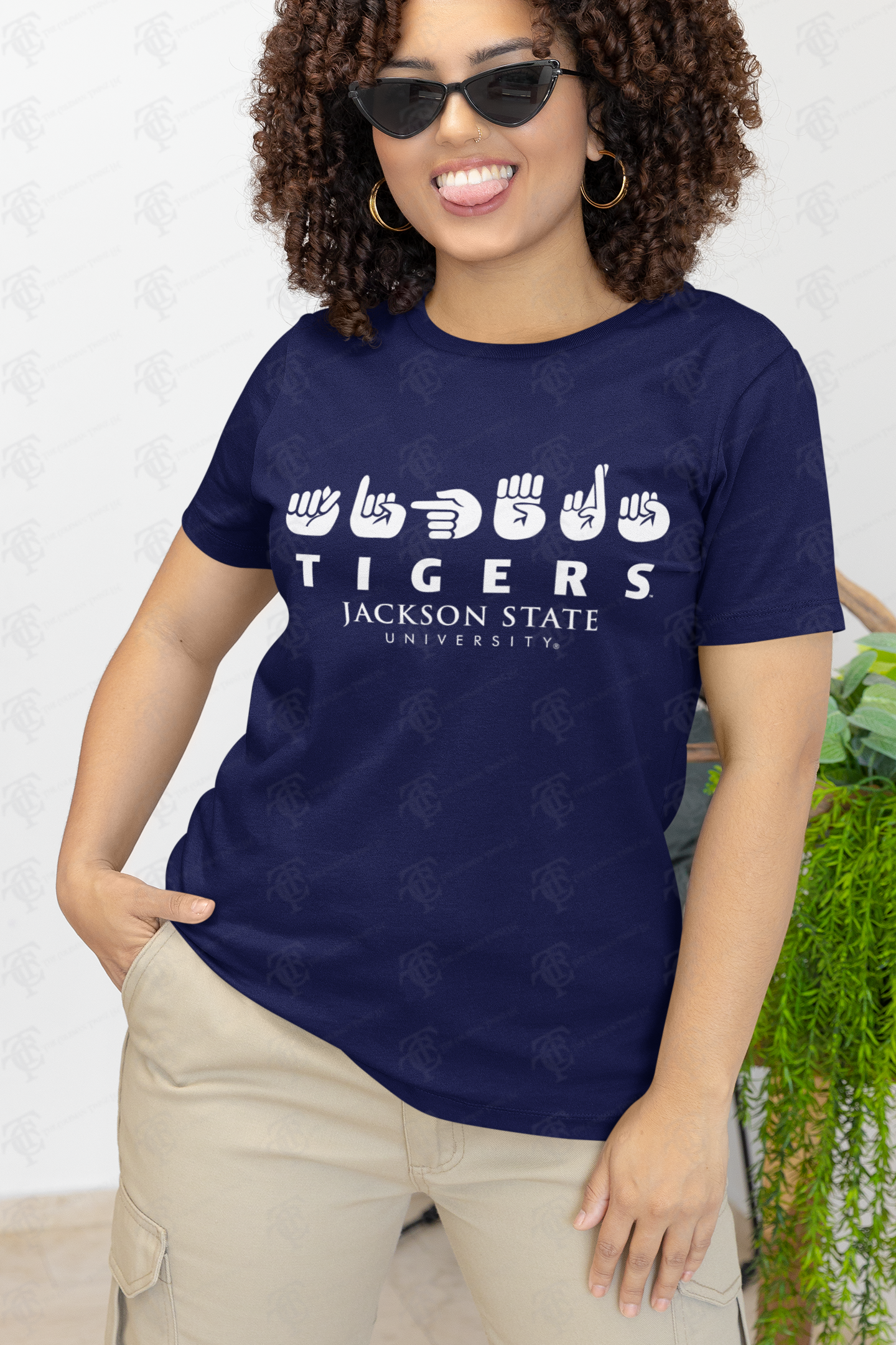 Unisex crew neck T-shirt in navy blue, worn by model, with Tigers and Jackson State logo