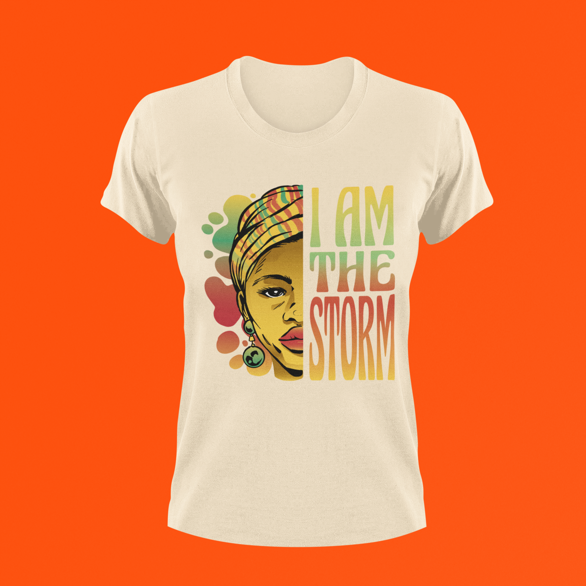 Cream short-sleeve T-shirt with front portrait graphic and “I AM THE STORM” text