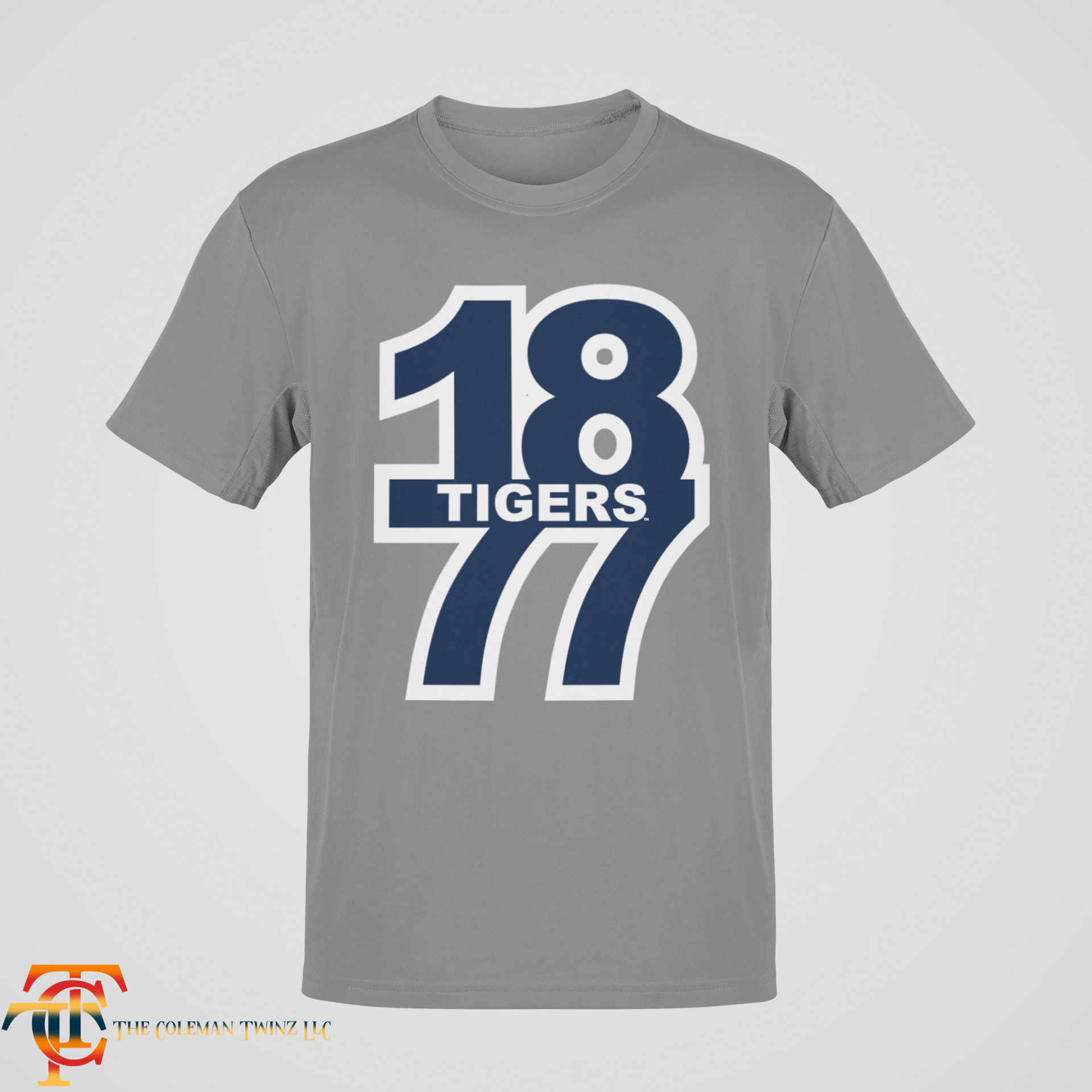 Gray crew neck short sleeve t-shirt with “18 Tigers 77” front graphic