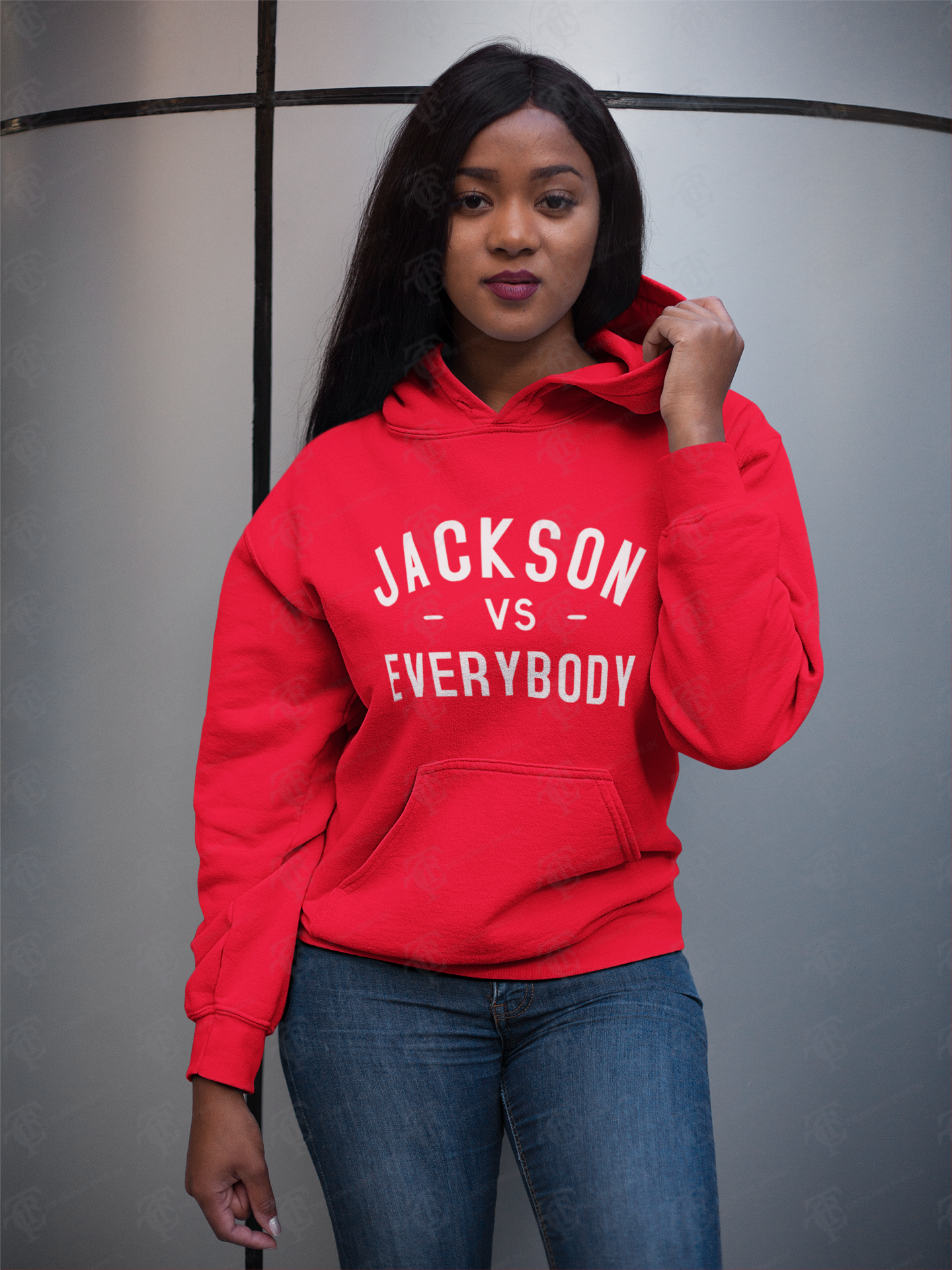Red pullover hoodie with front pocket and white slogan text