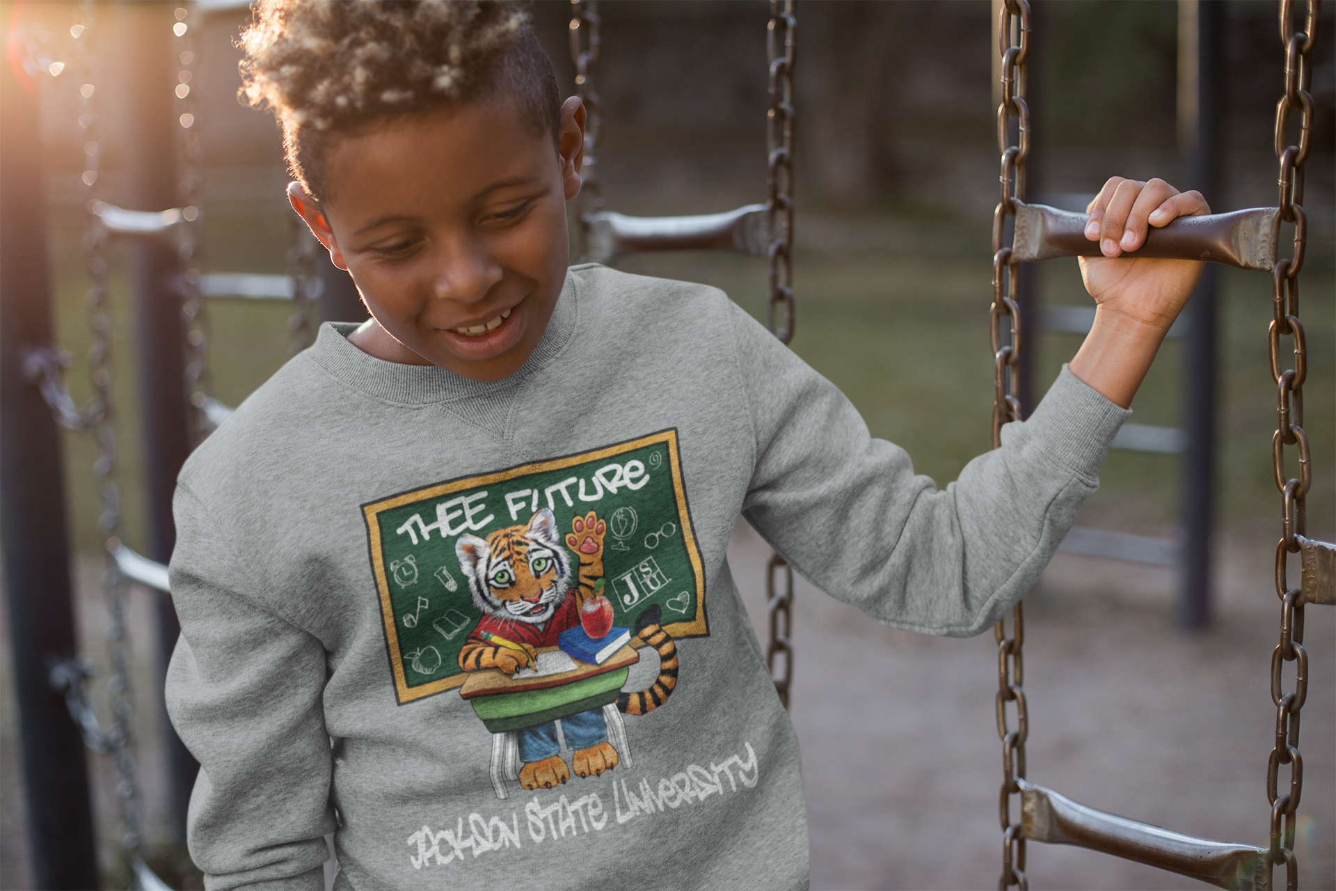 Youth crewneck sweatshirt in athletic heather grey with front cartoon graphic