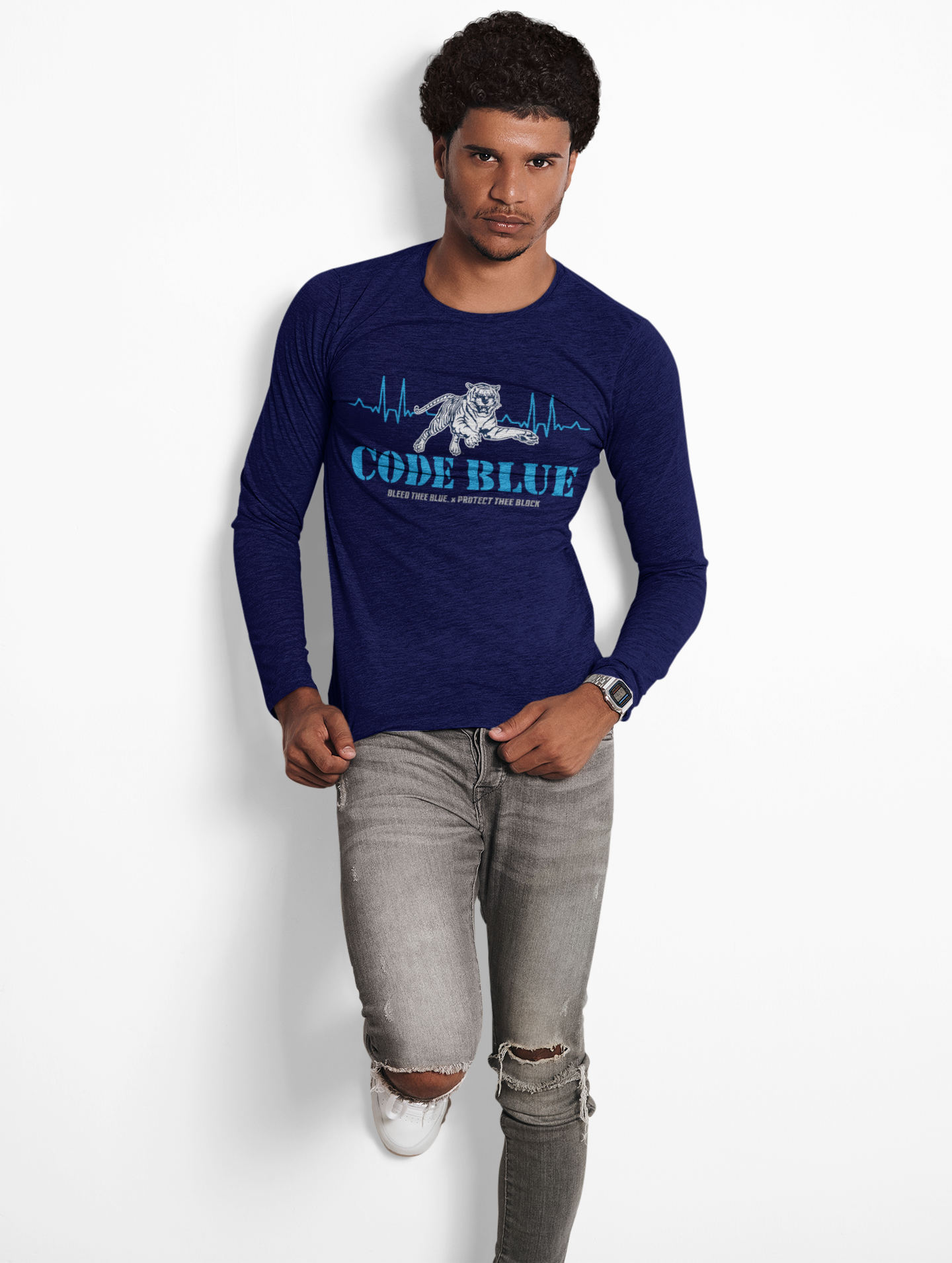 Navy blue long sleeve crewneck T-shirt with “CODE BLUE” wolf heart-rate graphic, on model