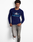 Navy blue long sleeve crewneck T-shirt with “CODE BLUE” wolf heart-rate graphic, on model
