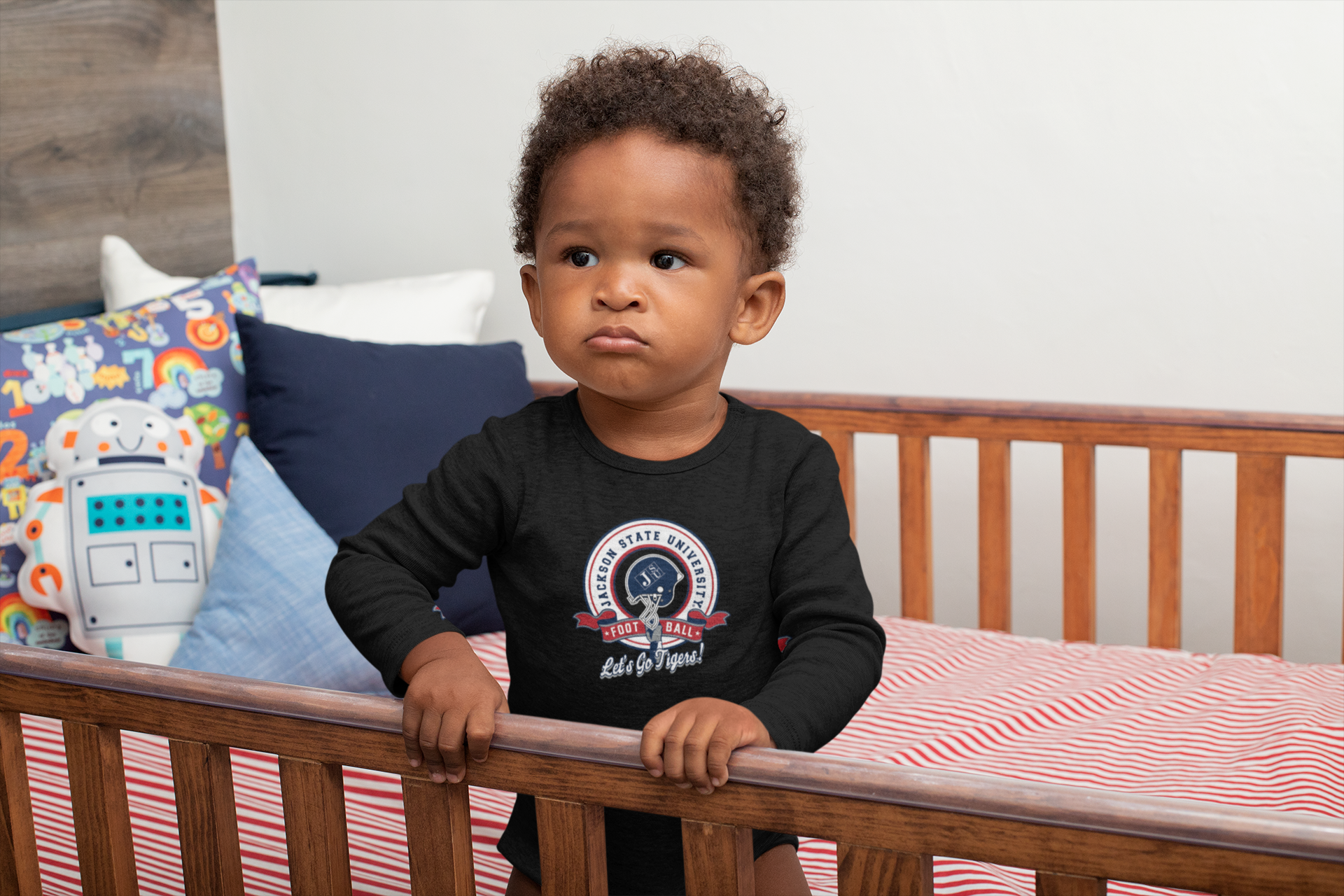 Infant long sleeve bodysuit, black with round college logo graphic on chest