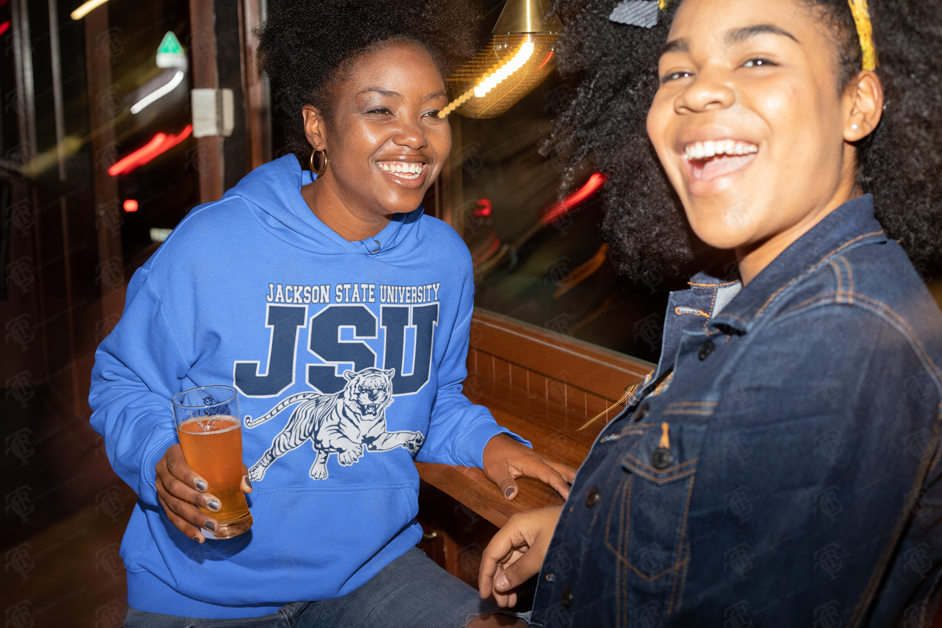 Blue unisex pullover hoodie with JSU leaping tiger graphic on the chest