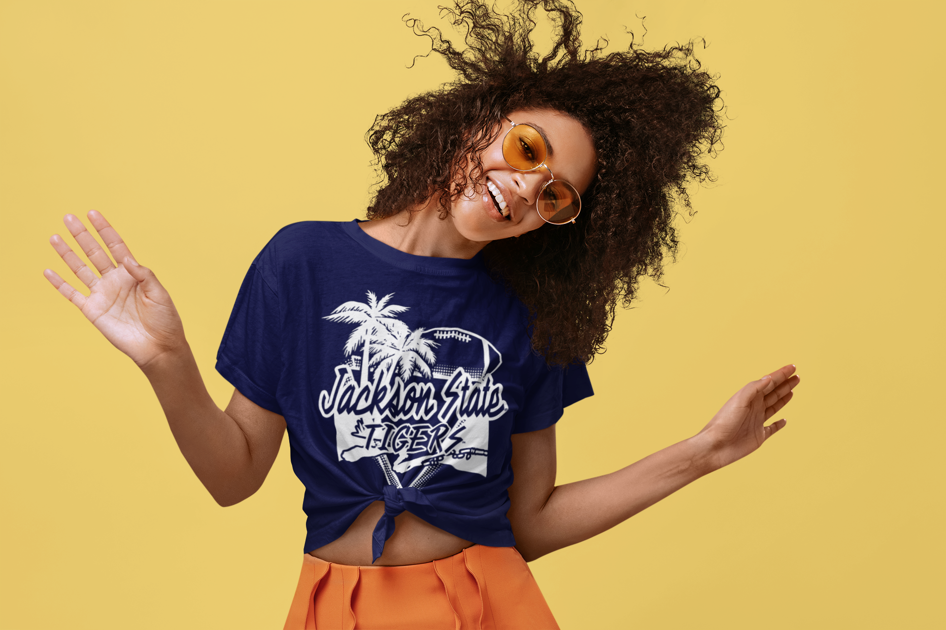Navy blue short sleeve T-shirt with Tigers logo, worn with tied front
