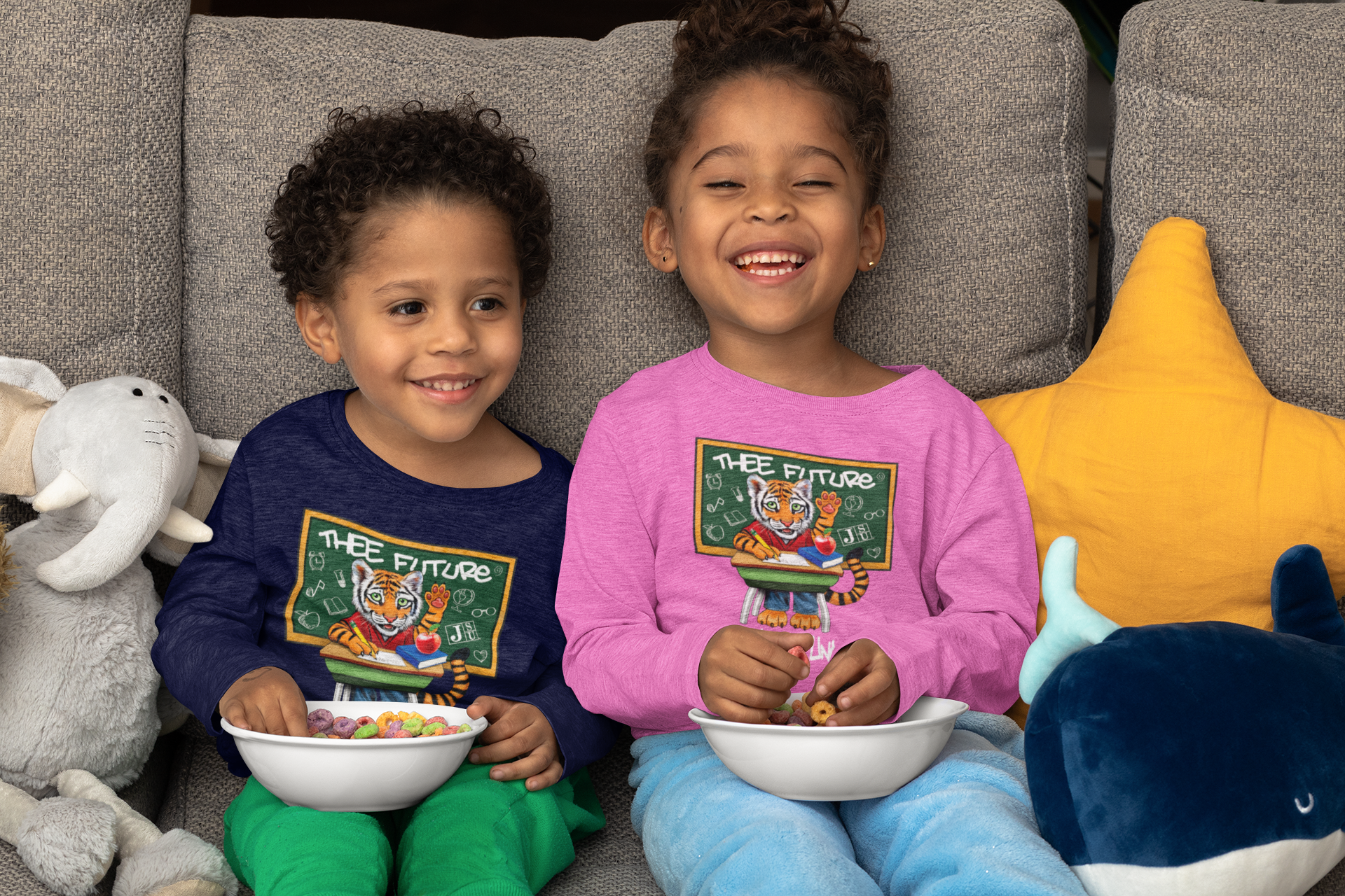 Toddler long-sleeve crewneck T-shirts with sports graphic, navy and pink, worn by children