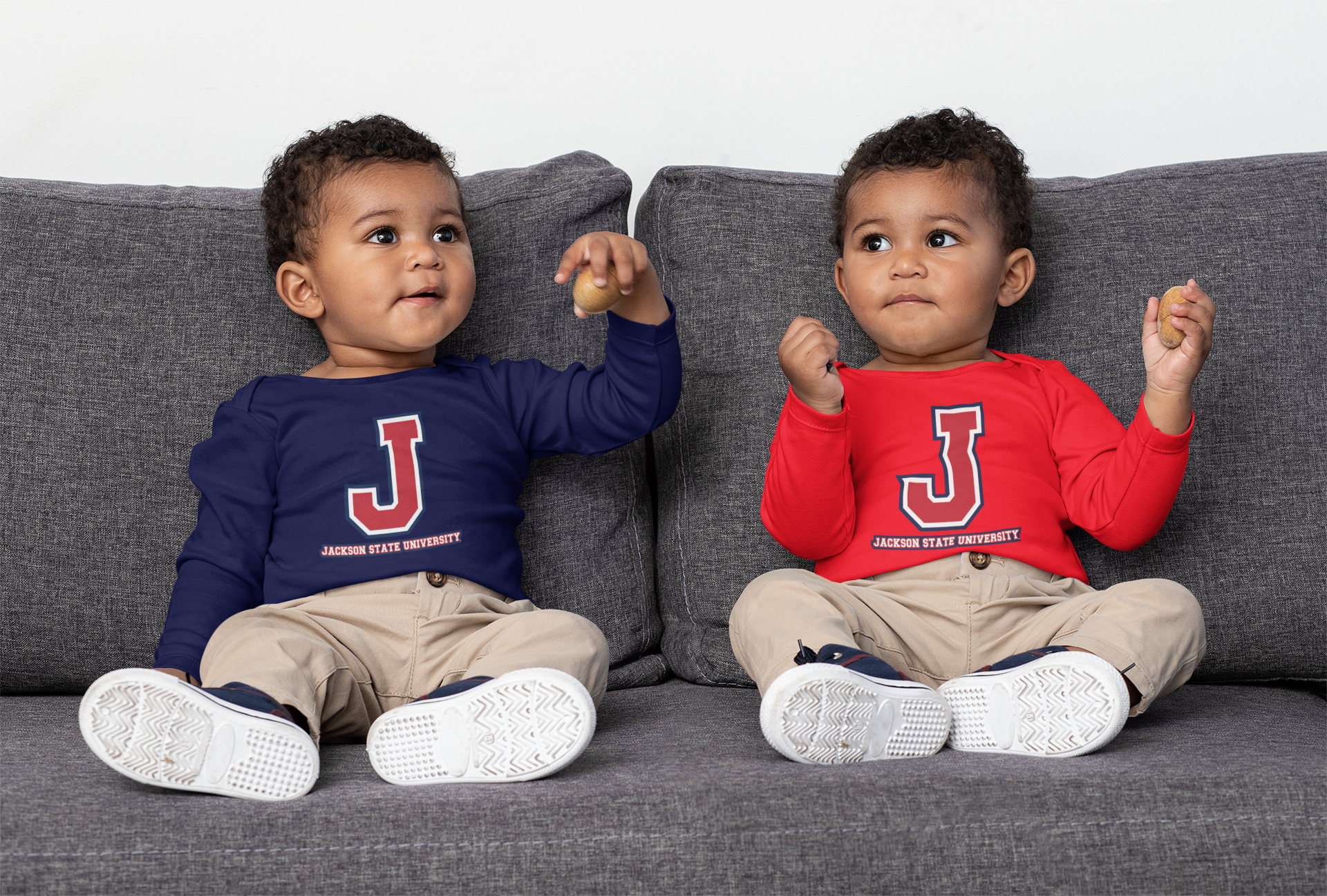 Infant long sleeve bodysuits, navy and red, both with J logos and Jackson State University text