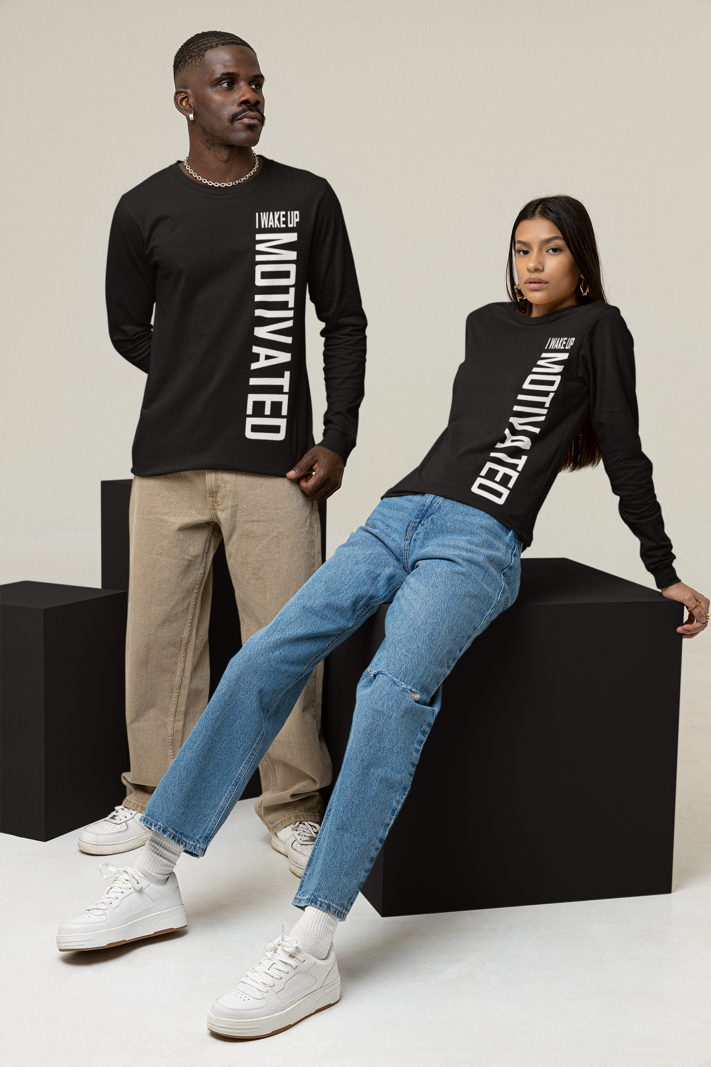 Black unisex crew neck long sleeve T-shirt with white front and sleeve text