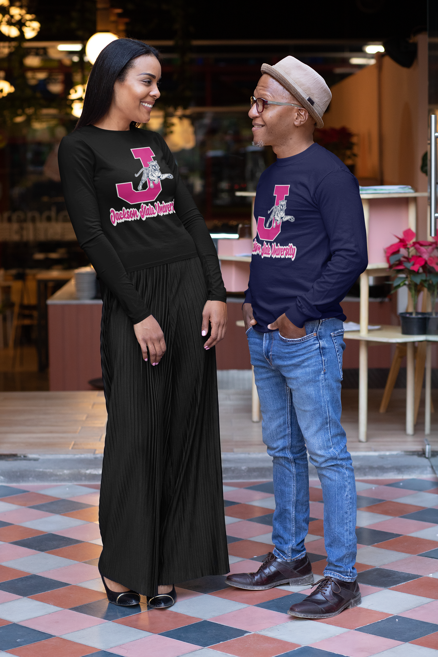 Black long-sleeve crew neck T-shirt with pink J leaping tiger and school text front graphic
