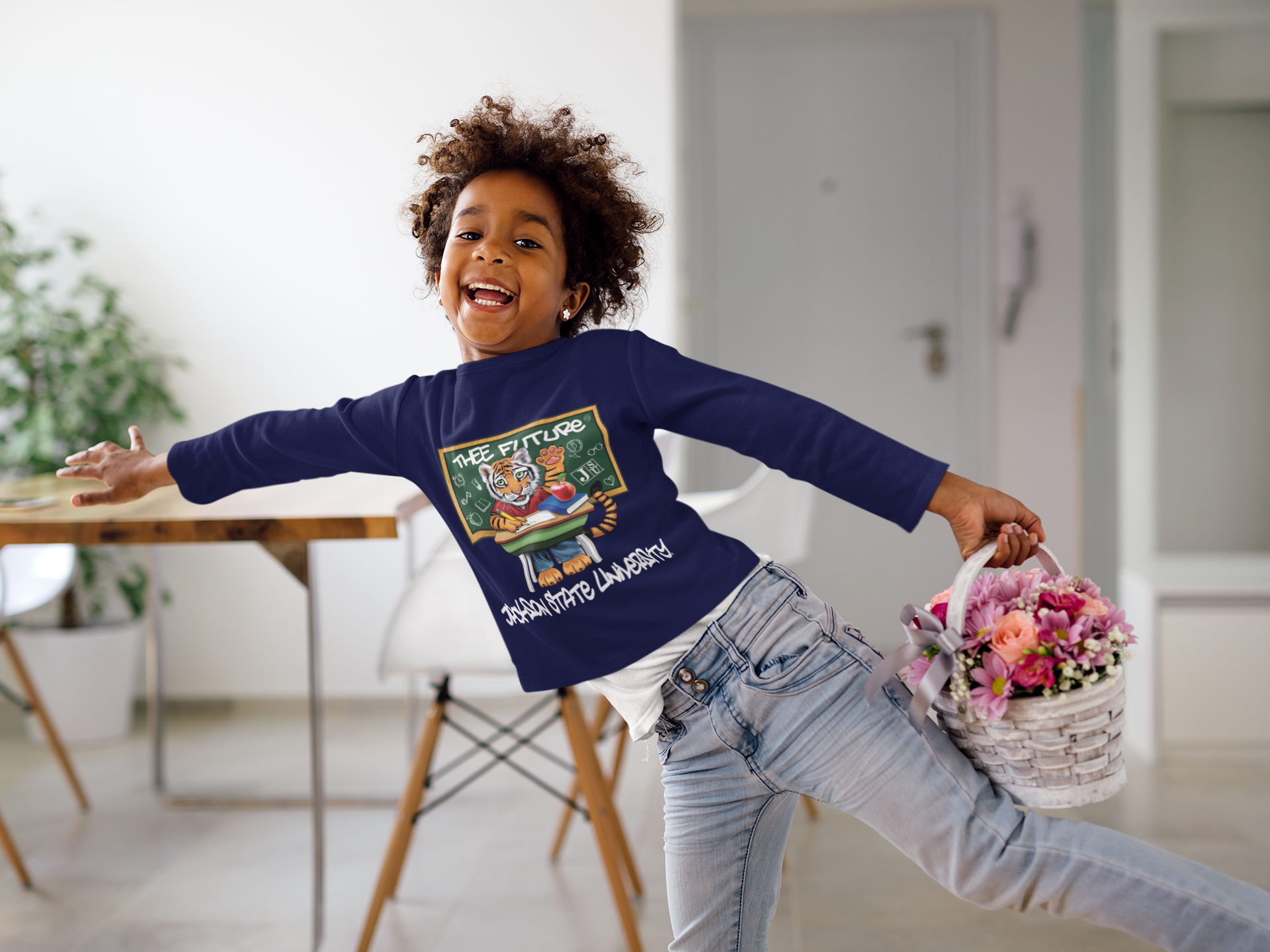 Youth long-sleeve crewneck T-shirt, navy blue with colorful front graphic and script text