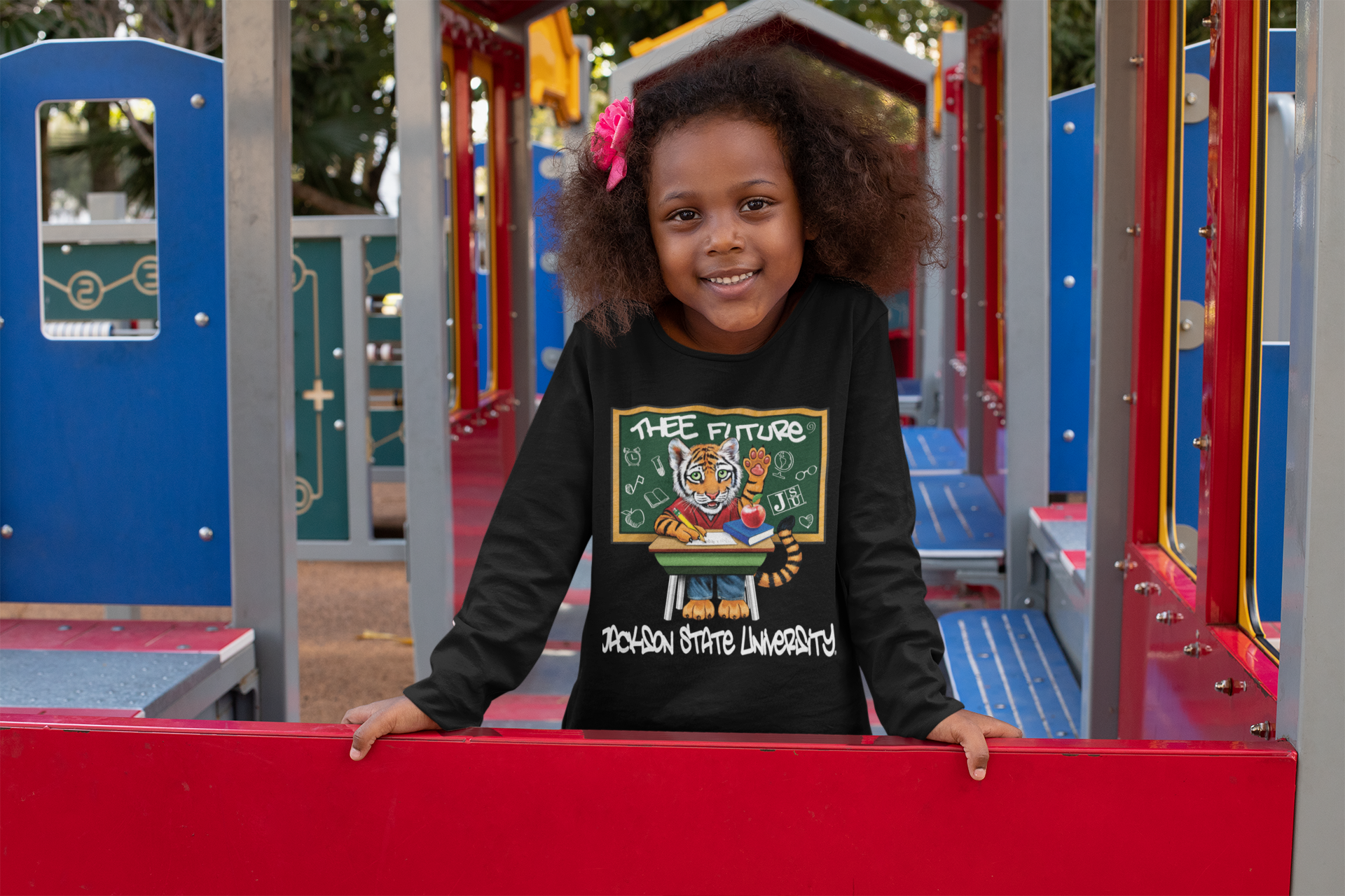 Youth long-sleeve crewneck T-shirt, black with colorful front graphic and script text