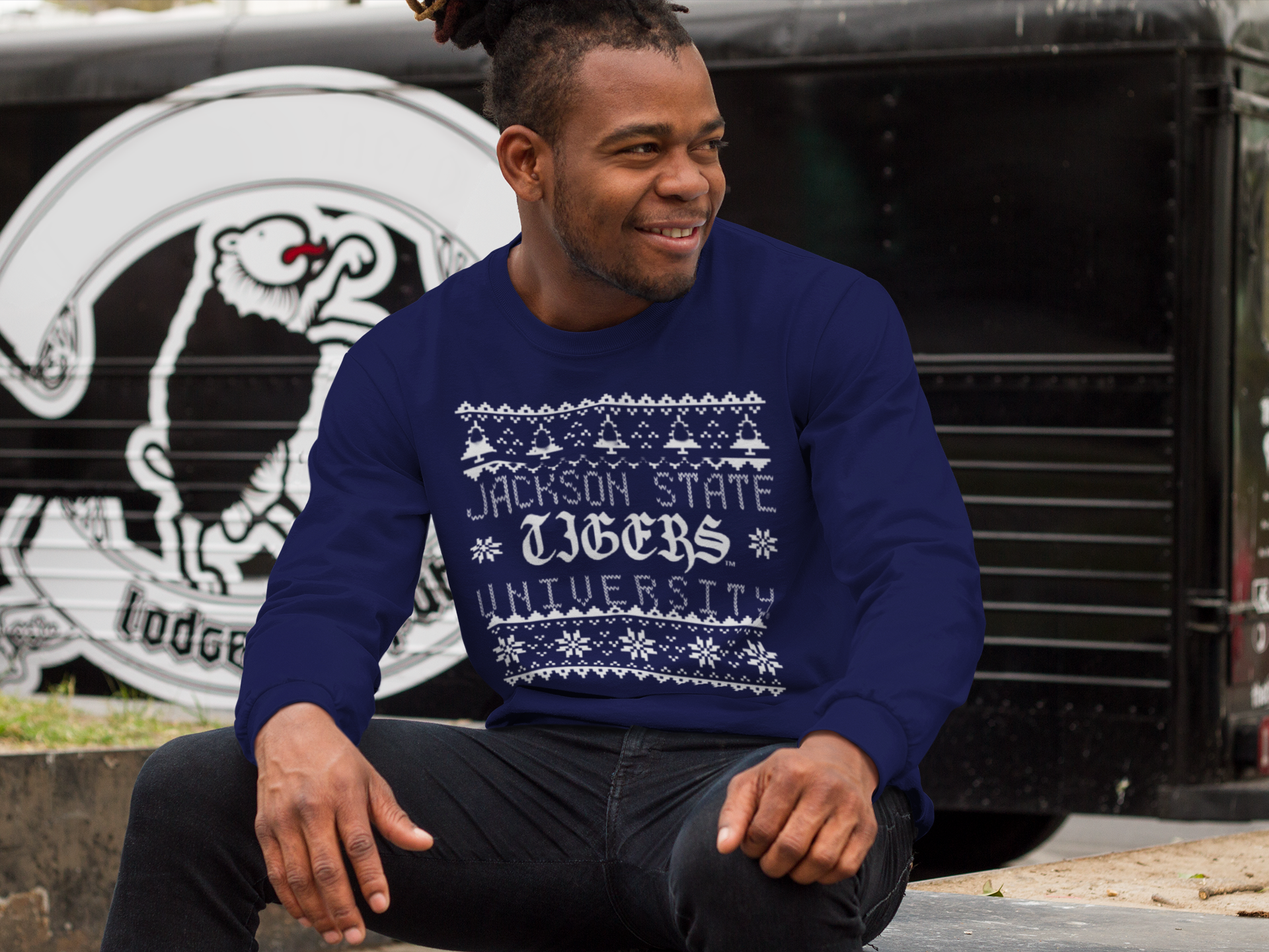 Dark blue short-sleeve T-shirt with white winter pattern and university logo graphic