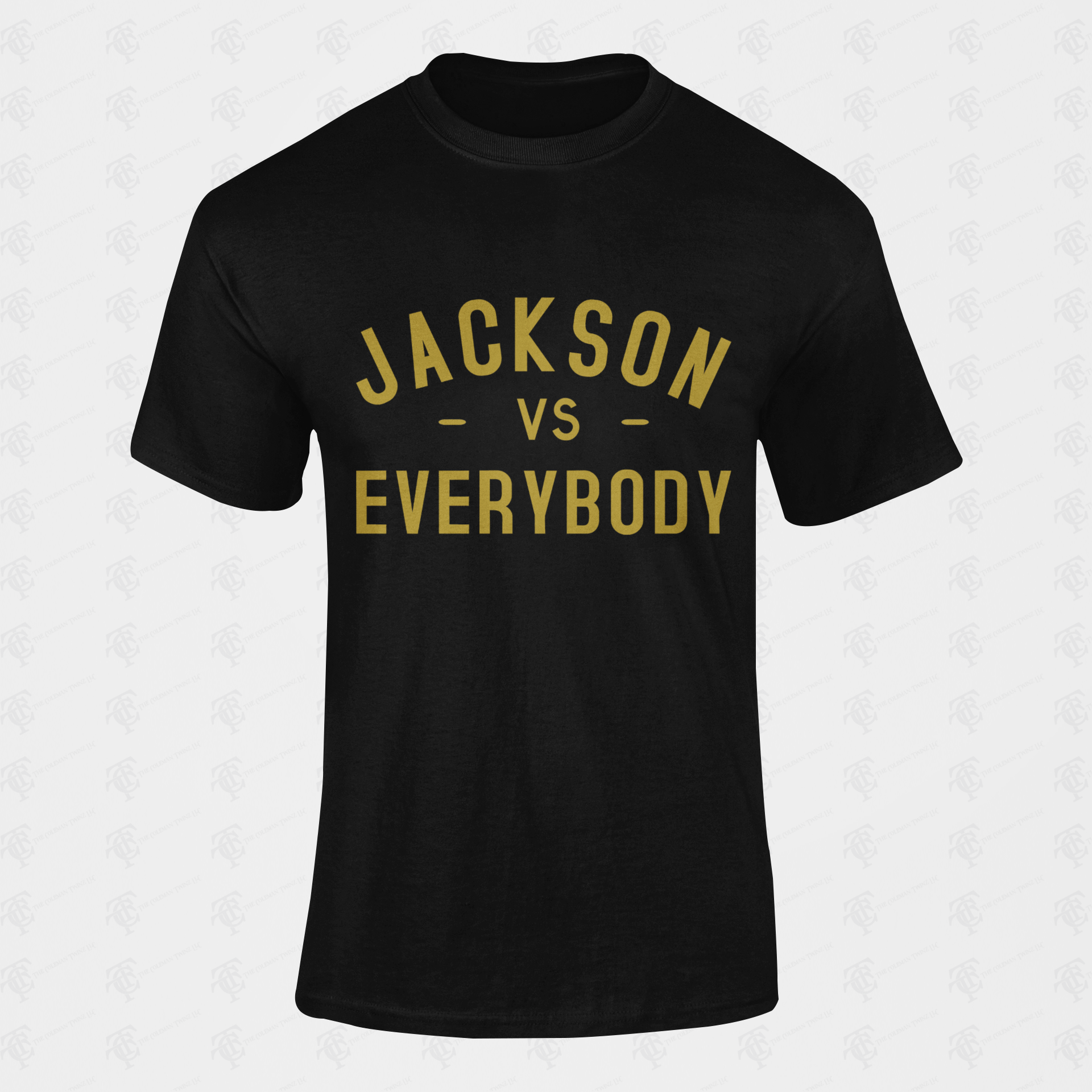 Black crewneck short sleeve T-shirt with centered gold “JACKSON vs EVERYBODY” graphic.