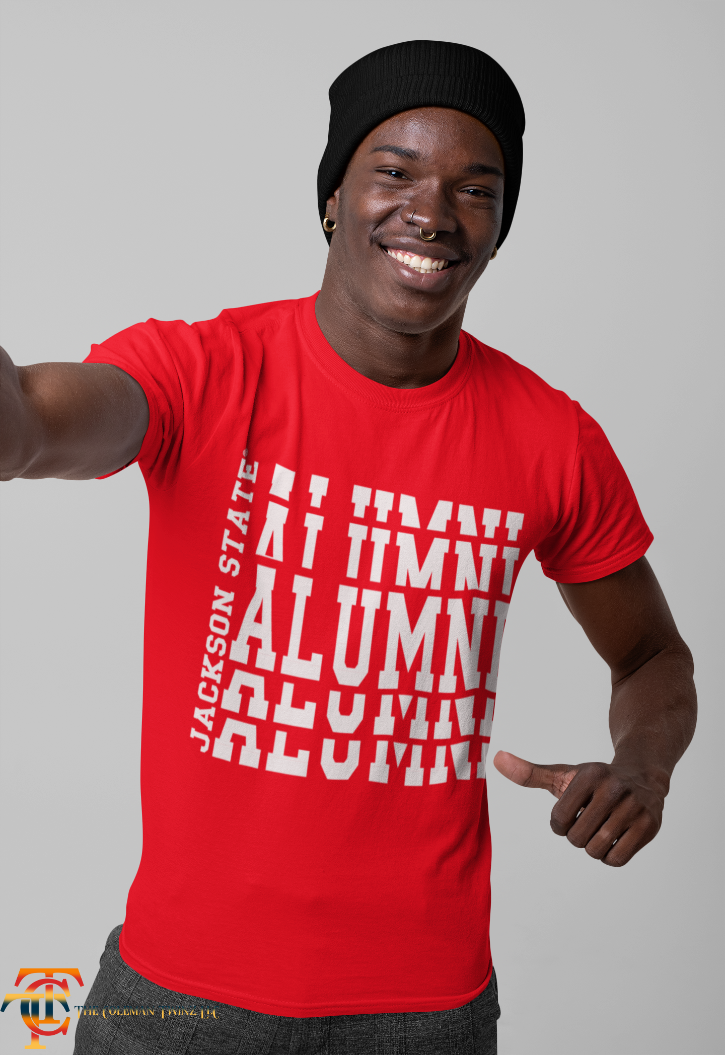 Red crew-neck short sleeve T-shirt with white stacked “Alumni” graphic on model