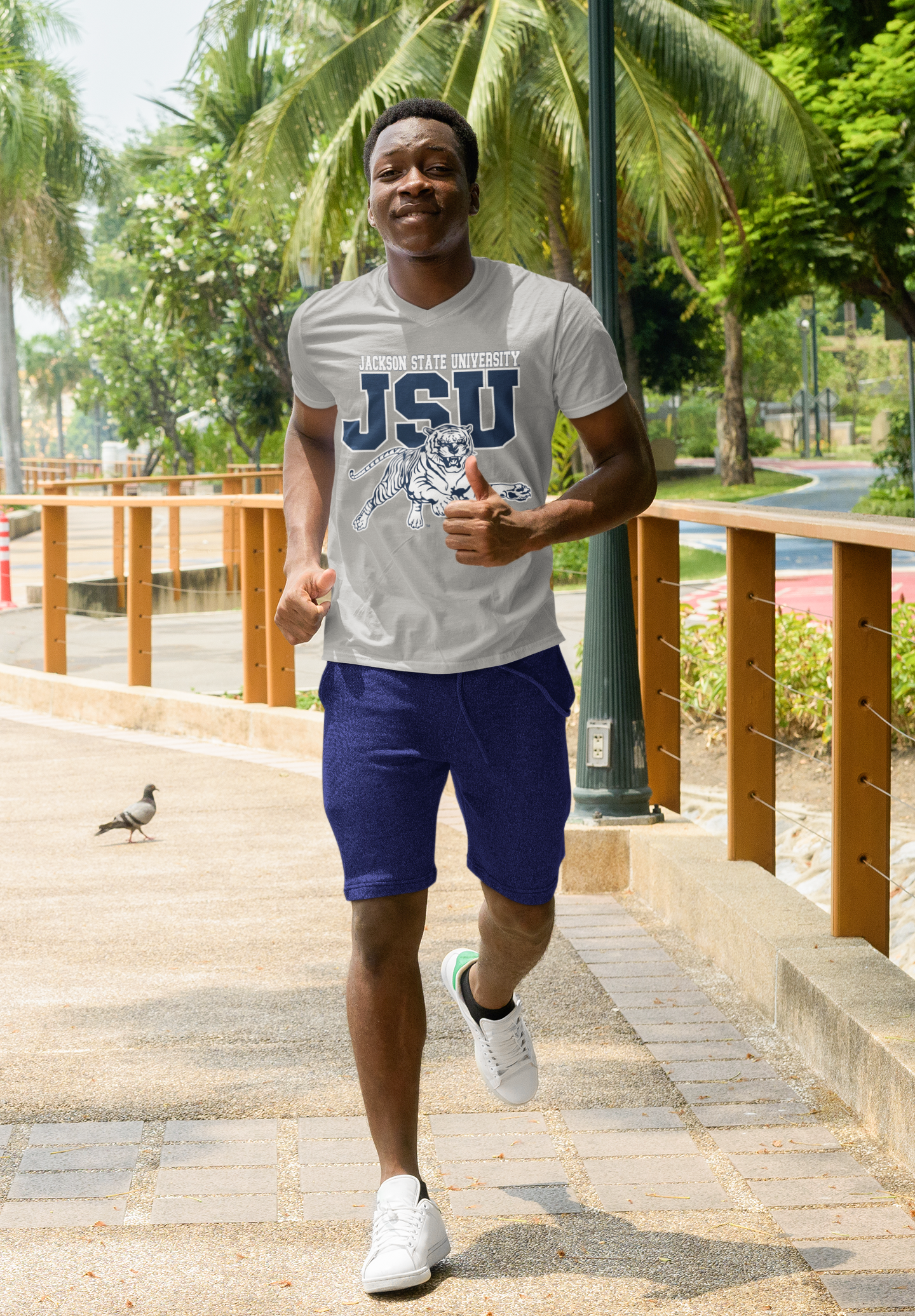 White V-neck T-shirt with JSU lettering and leaping tiger graphic on model