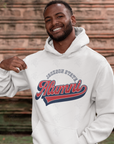 White pullover hoodie with Alumni logo on chest, worn by a smiling man