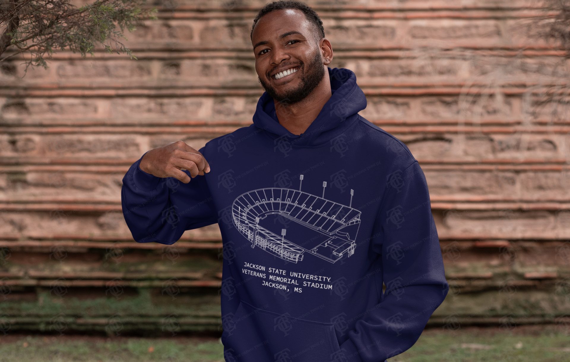 Navy unisex pullover hoodie worn by a person; stadium graphic and drawstring hood