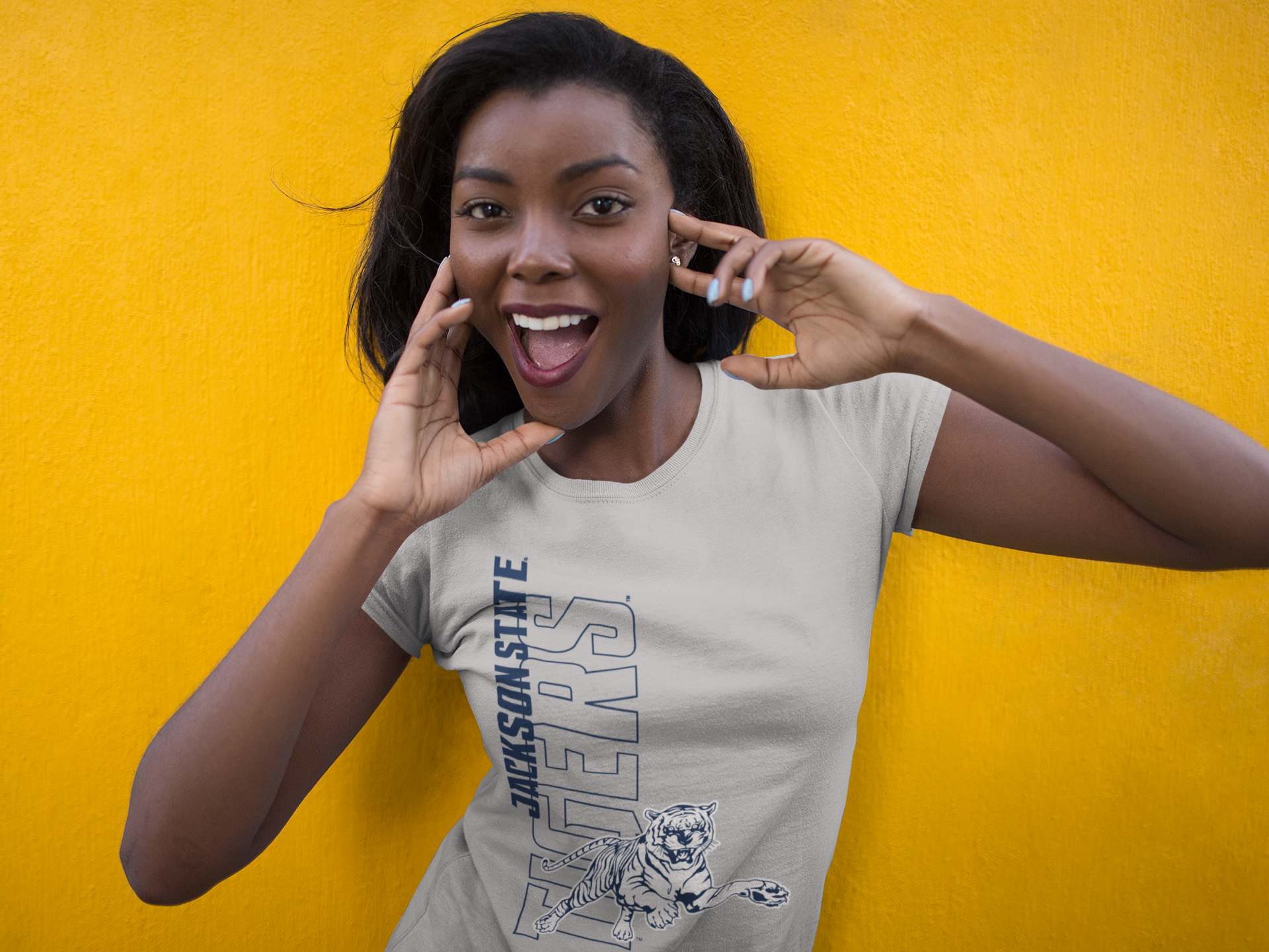 Unisex crewneck T-shirt in athletic heather gray with leaping tiger graphic on chest