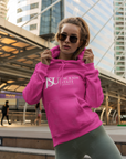 Pink pullover hoodie on model with front kangaroo pocket and Jackson State logo graphic