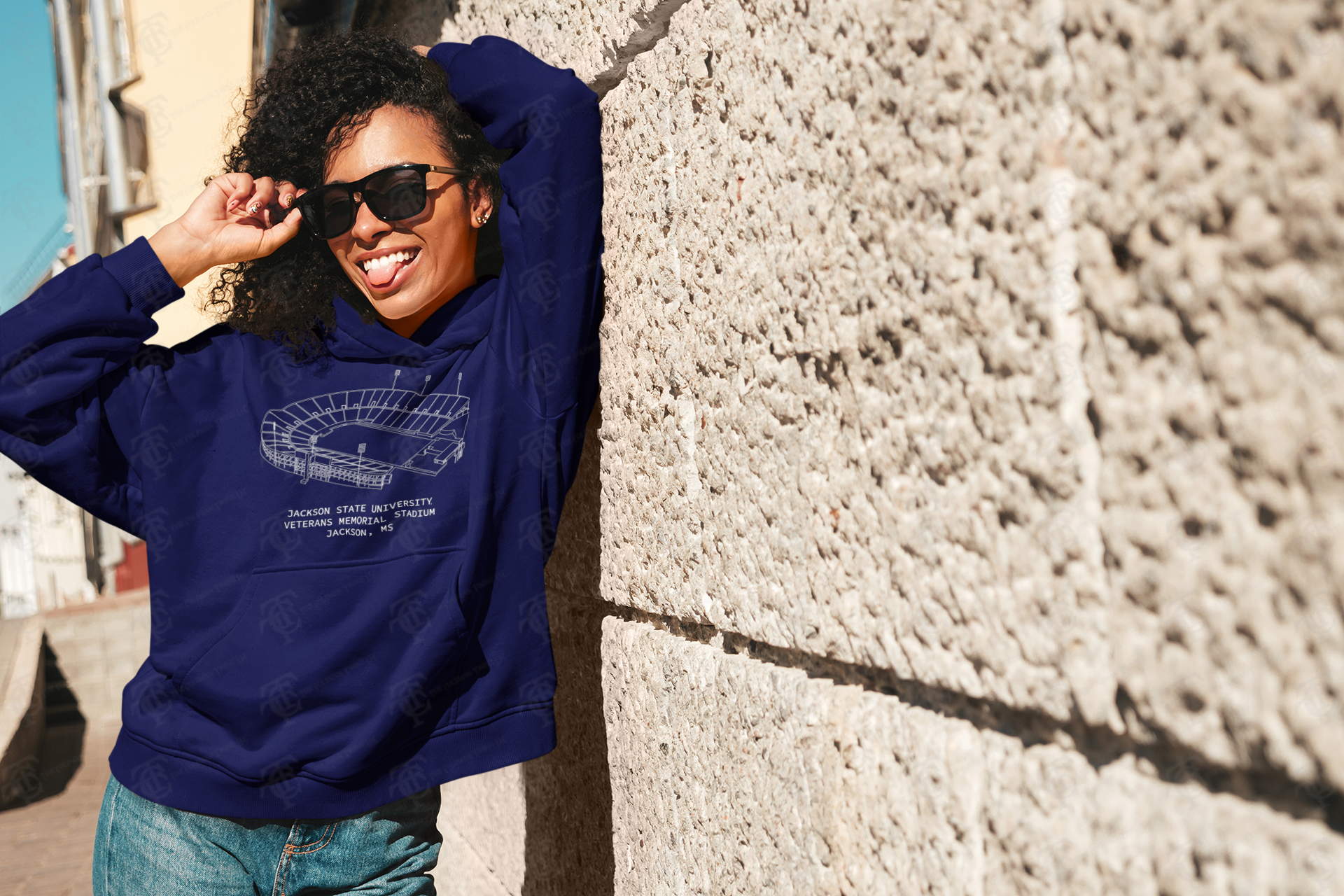 Navy unisex pullover hoodie with stadium graphic and drawstring hood