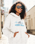 White pullover hoodie with 'Code Blue' illustrated chest graphic, worn by smiling model.