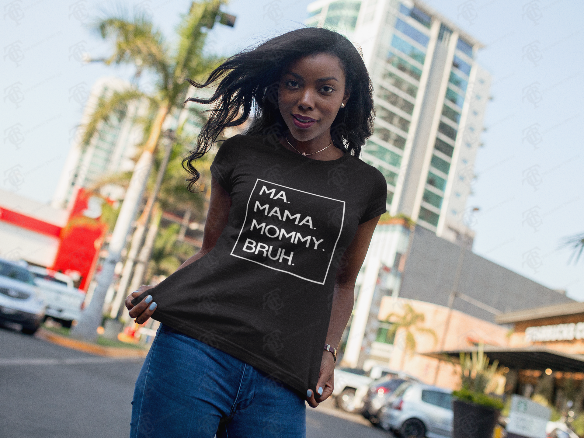 Unisex crewneck T-shirt on model, black with centered white boxed 'MA. MAMA. MOMMY. BRUH.'