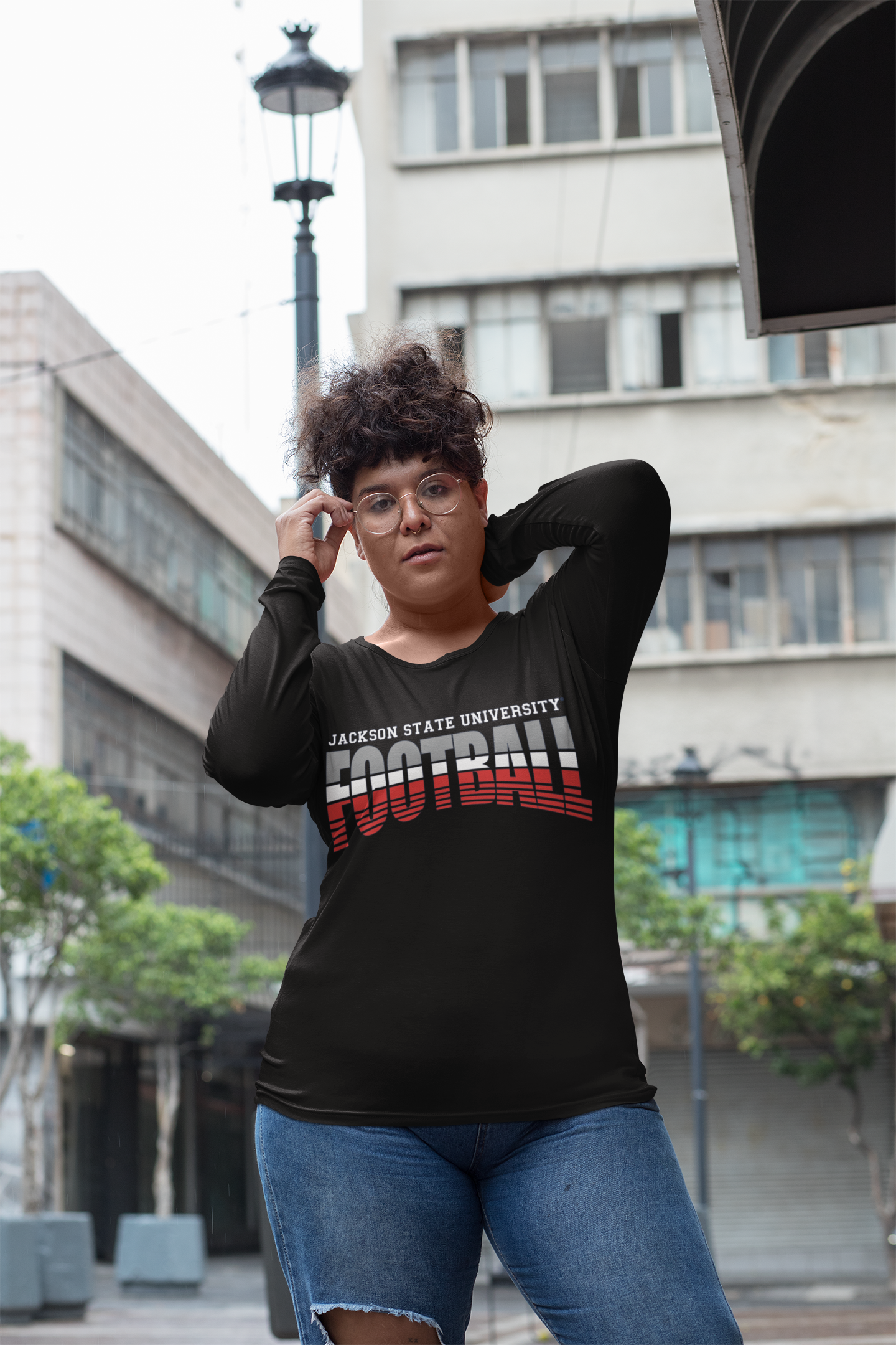 Black long-sleeve crew neck football T-shirt with stacked "Football" logo on chest