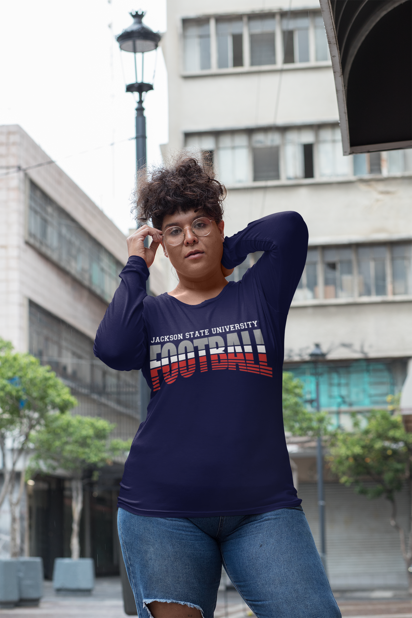 Navy long-sleeve crew neck football T-shirt with stacked "Football" graphic on chest