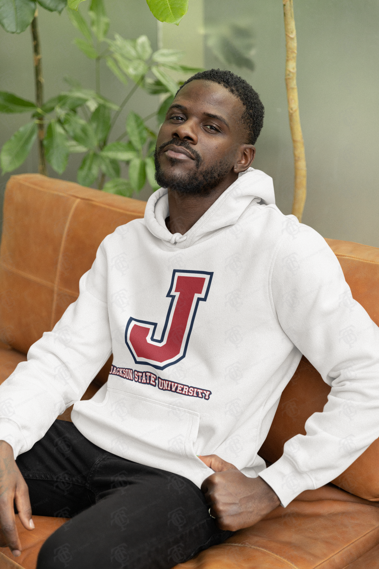 White pullover hoodie worn by a man, showing the front J logo and university text.