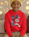 Red youth pullover hoodie worn by a child, featuring team graphic and football with white pom