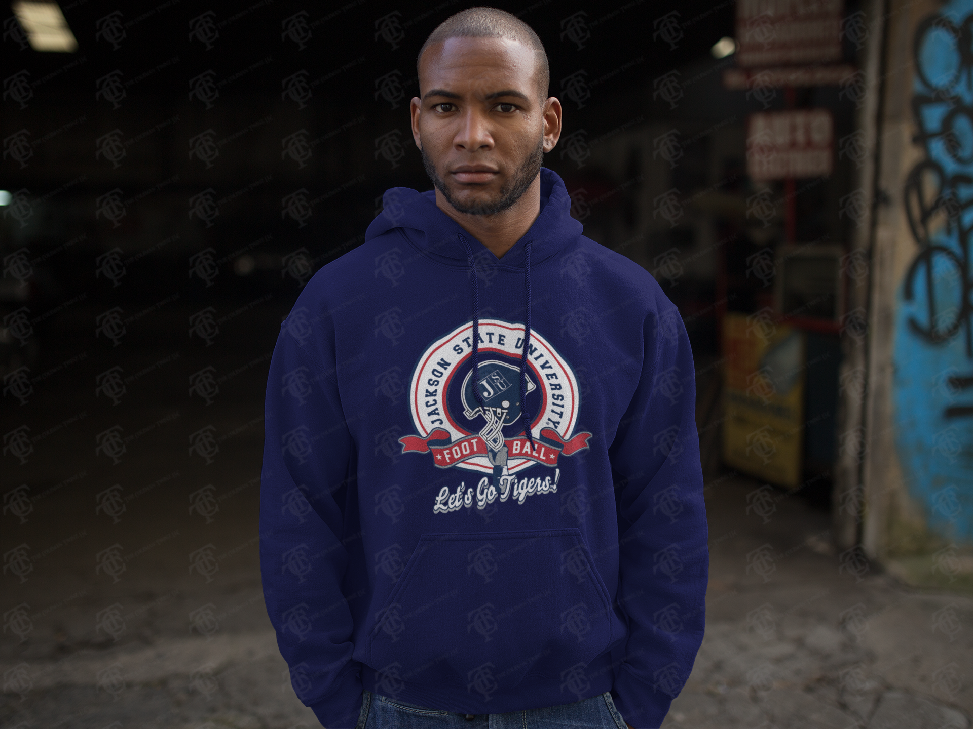 Unisex pullover hoodie in navy with Jackson State University football crest on front
