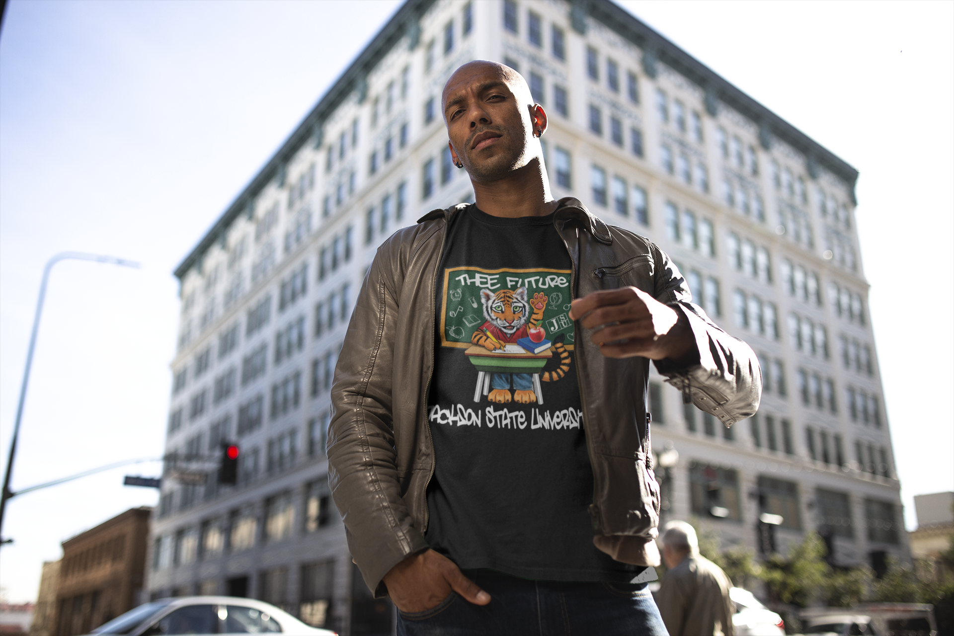 Black unisex crewneck T-shirt with front “Thee Future” cartoon graphic