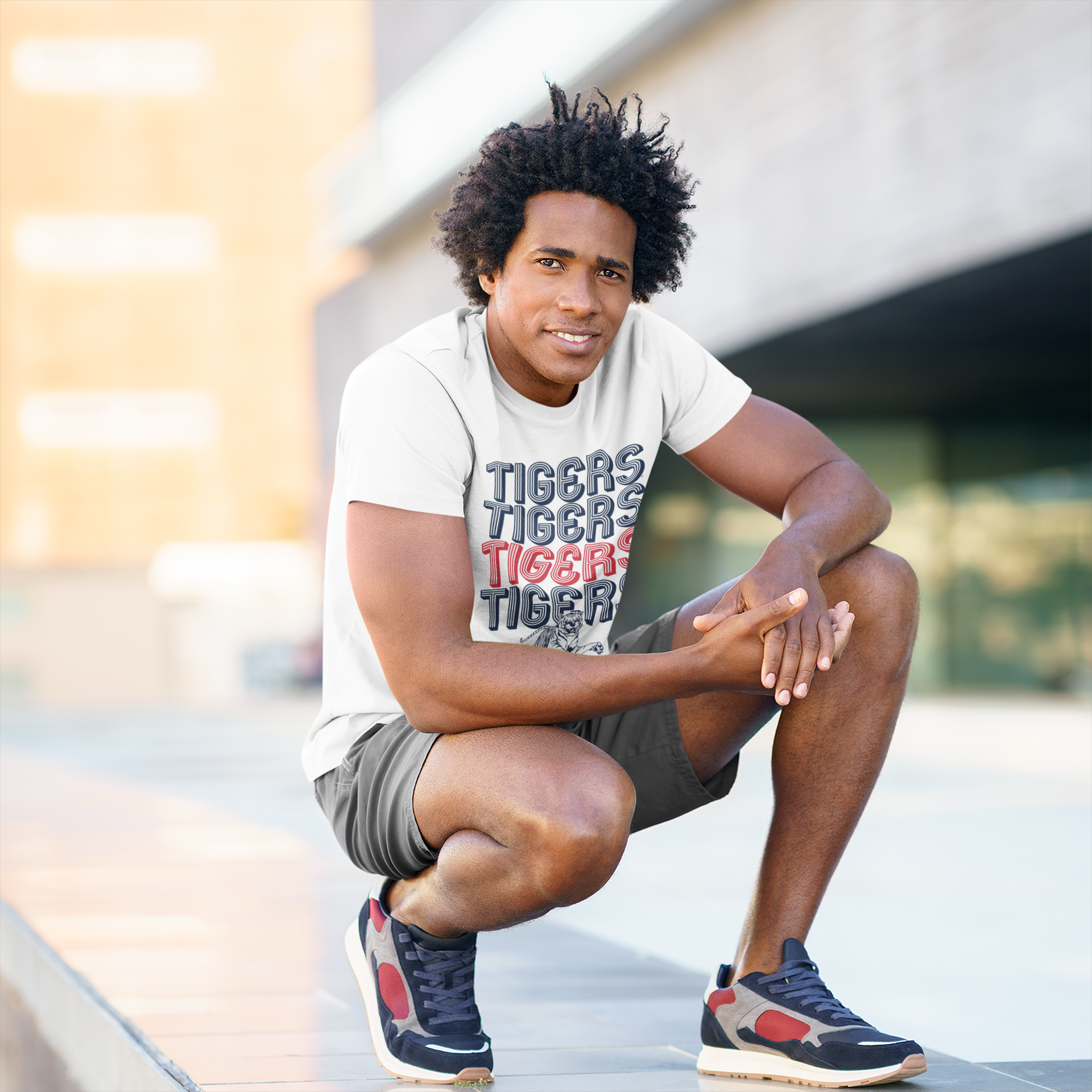Athletic heather grey crewneck T-shirt with stacked Tigers striped lettering and logo
