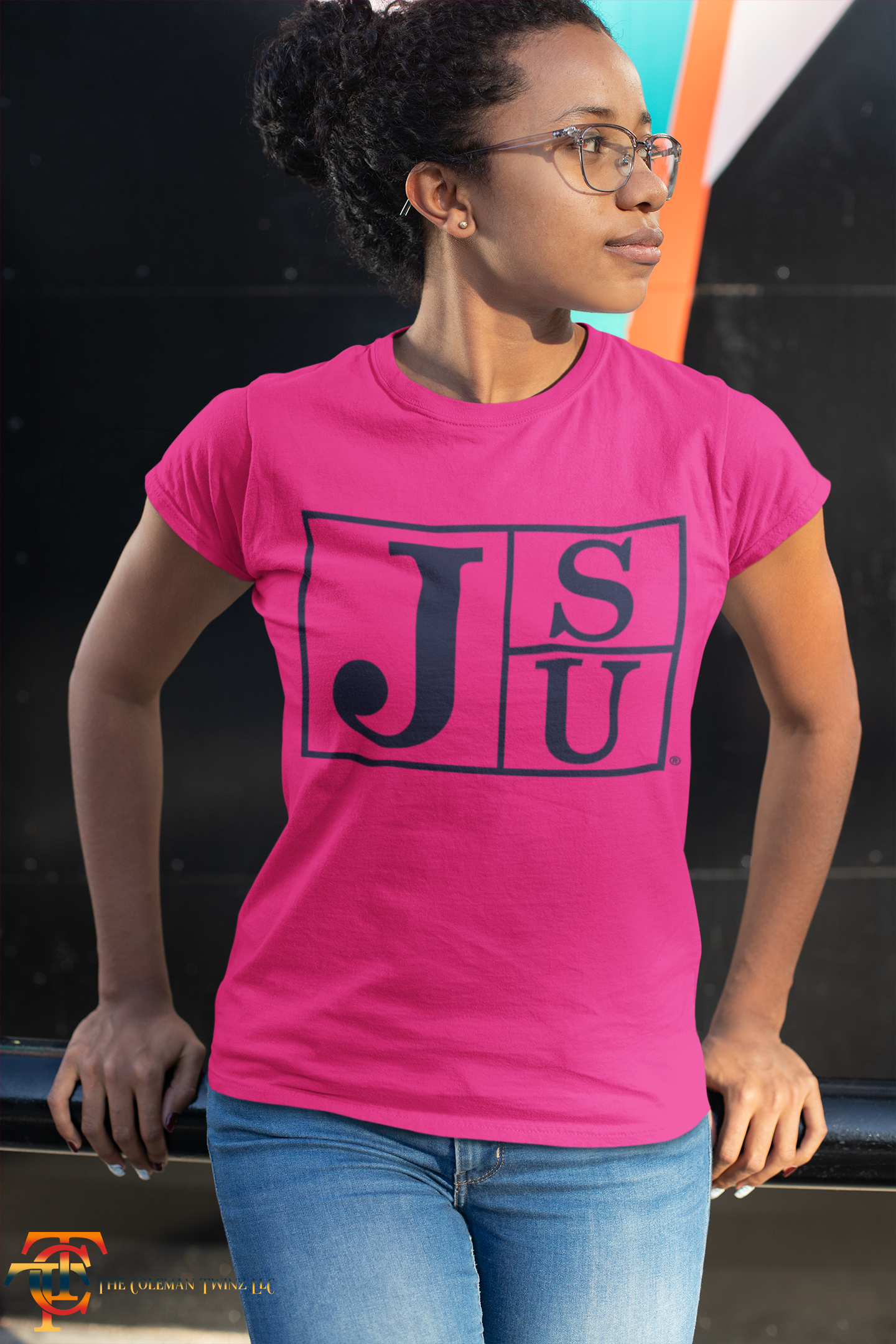Pink crew-neck short-sleeve T-shirt with blue JSU block-letter logo on front